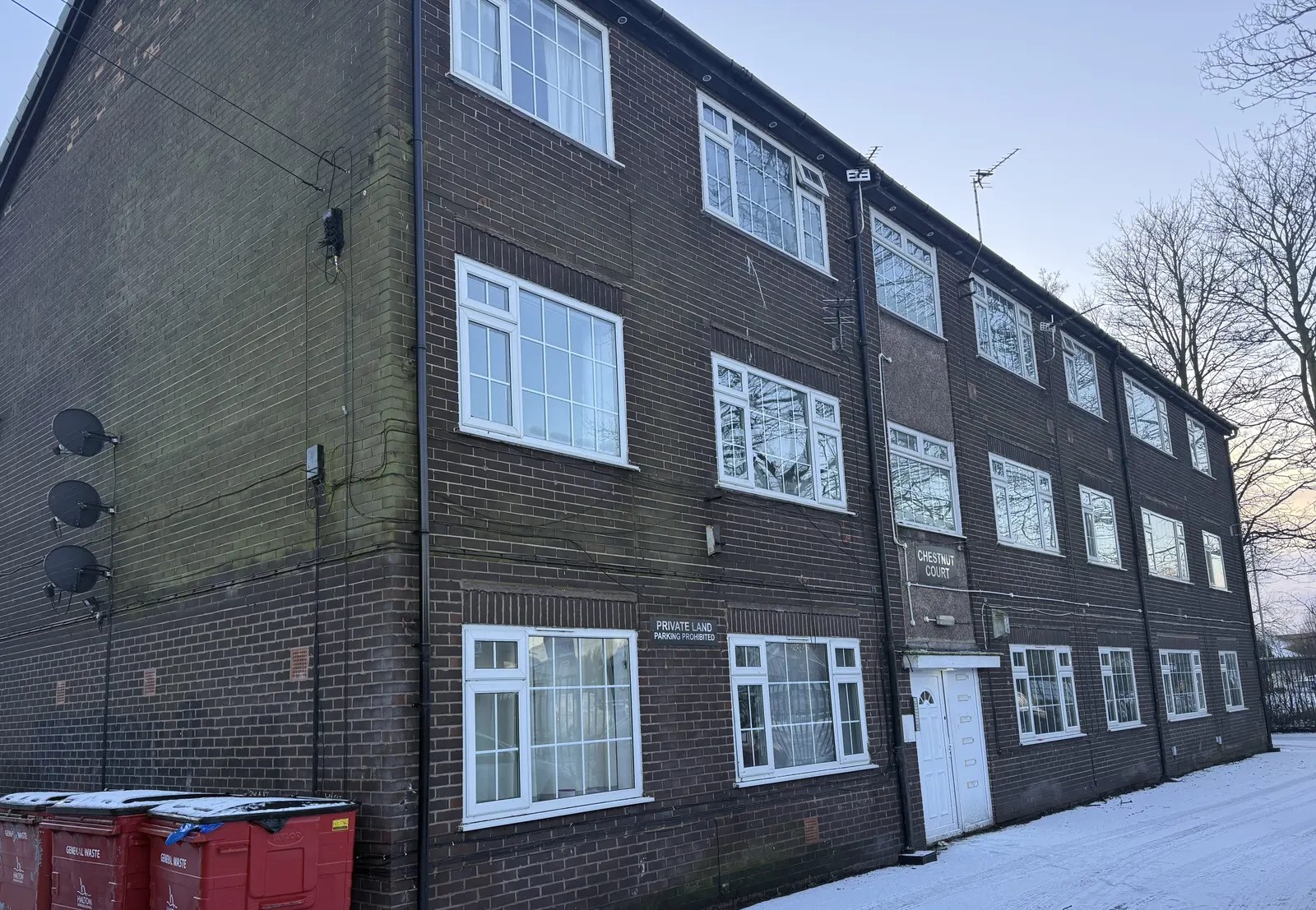 Three-storey brick apartment block managed by Rent My Block