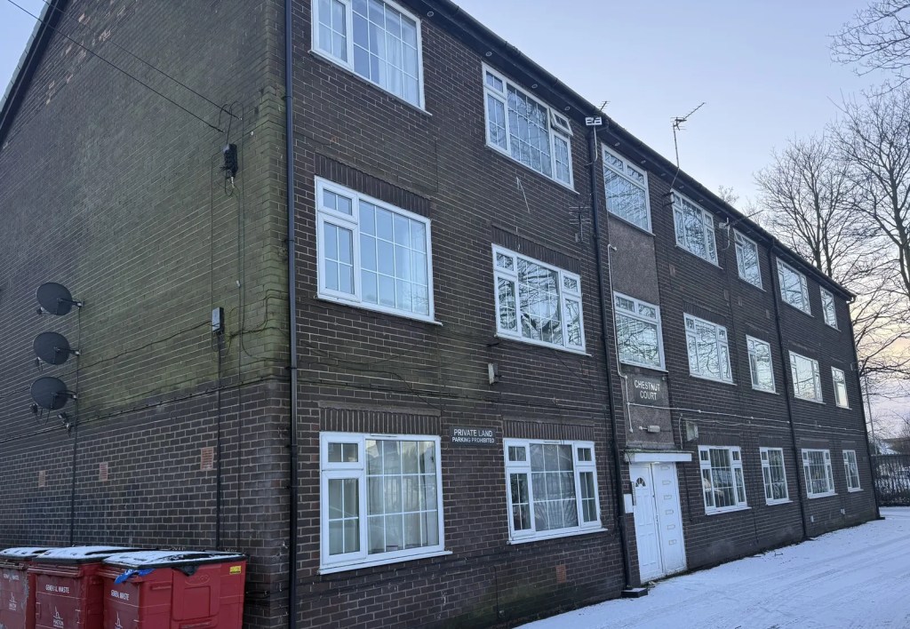 Three-storey brick apartment block managed by Rent My Block